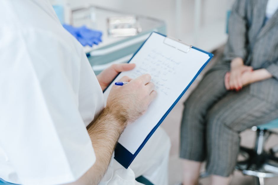 Doctor reviewing a patient intake assessment for inpatient drug rehab