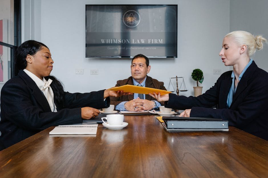 Family meeting with a malpractice attorney across a conference table