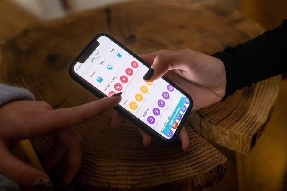 Smartphone displaying a mental health app login screen on a coffee table