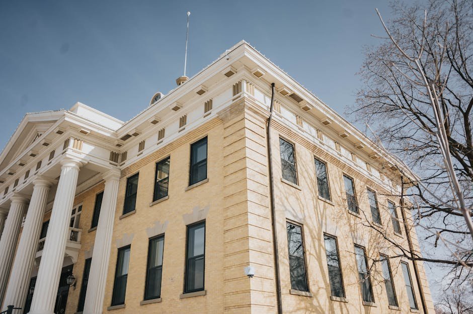 Federal courthouse exterior with the words United States District Court engraved above the entrance