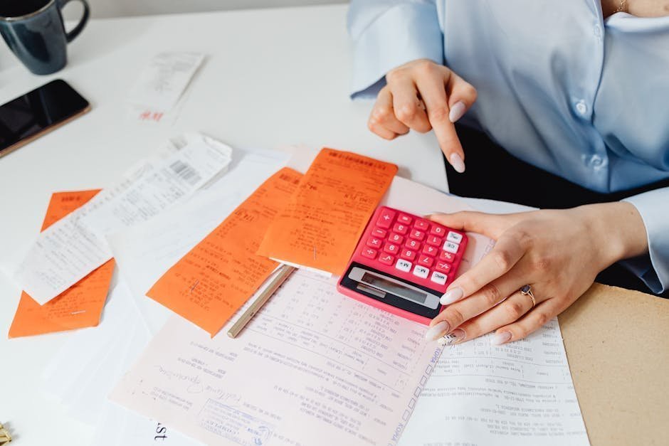 Spreadsheet of medical expenses and receipts organized in a folder for HSA recordkeeping