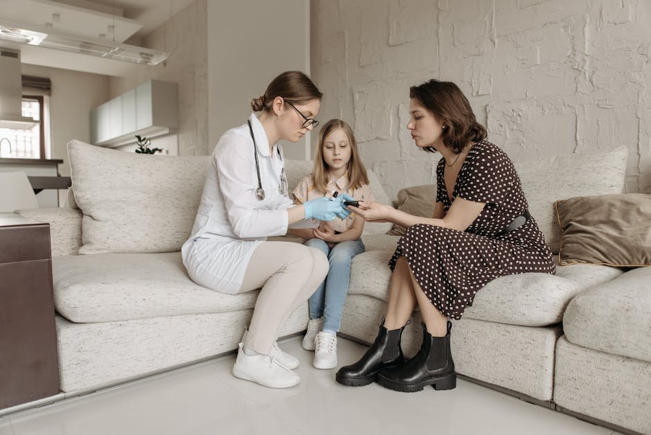 Registered dietitian meeting with patient and family at hospital bedside discussing meal plan