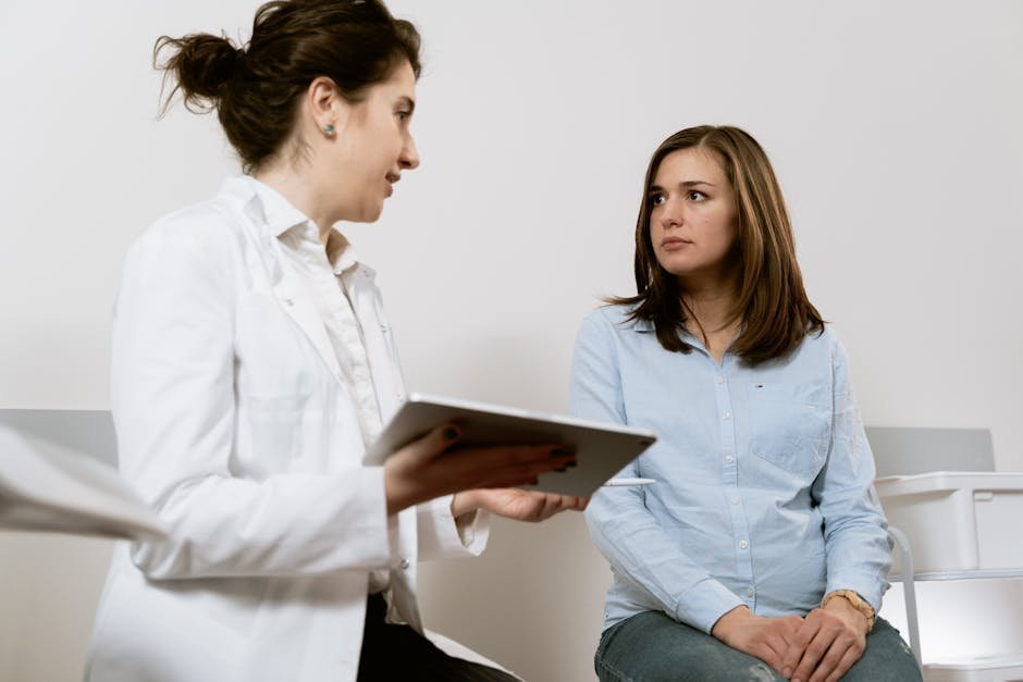 Pregnant patient receiving buprenorphine prescription consultation with addiction medicine physician