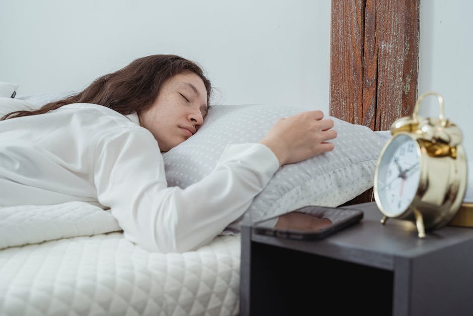 Sleep diary and clock on bedside table illustrating stimulus control rules