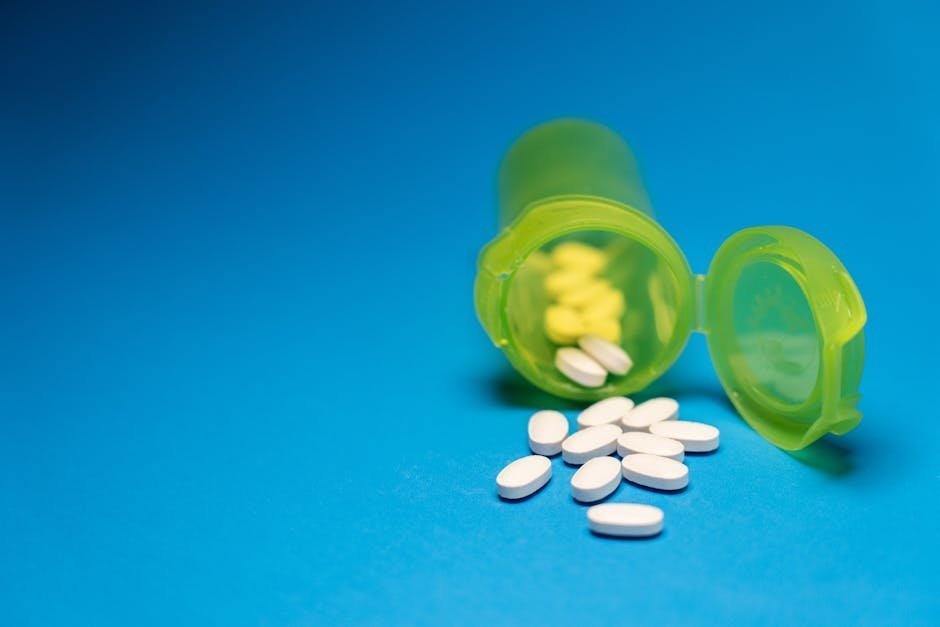 Pharmacy bottle of SSRI medication next to journal tracking menopause symptoms