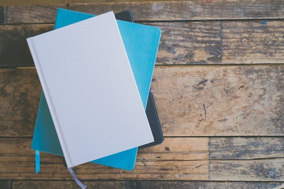 Books and journals about modern menopause medicine on a desk