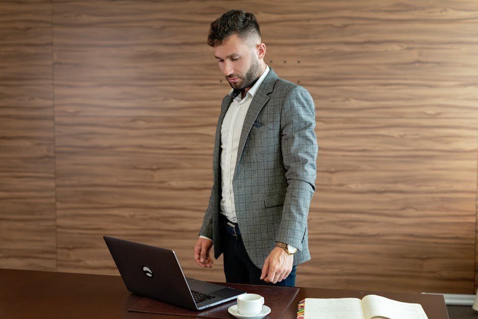 Man in casual clothes meeting with male therapist in informal office setting