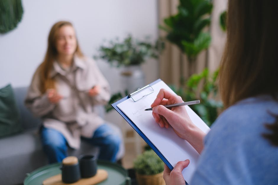 Therapist working with a client on religious deconstruction and identity rebuilding