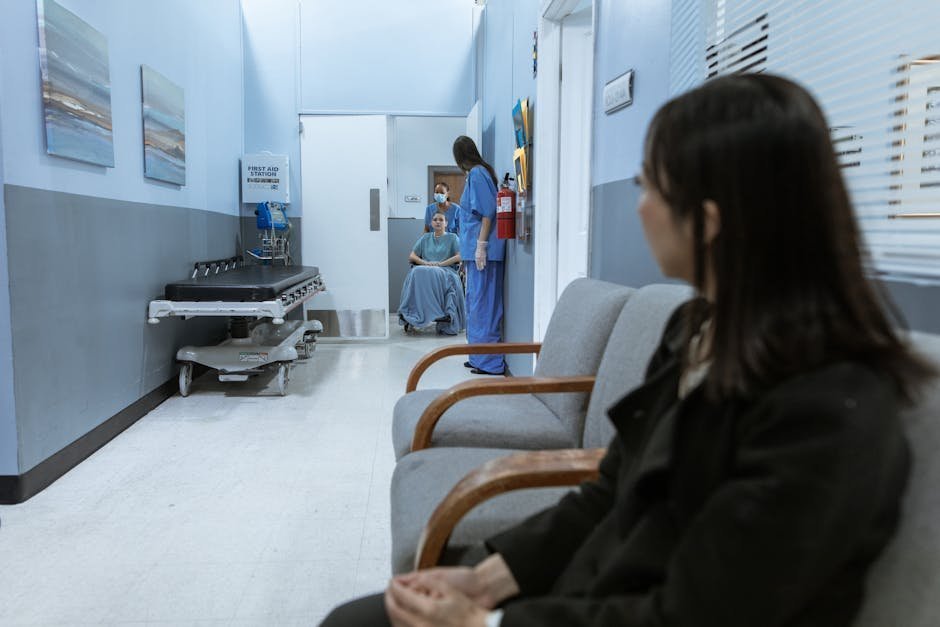Acute psychotic break treatment setting: a calm, well-lit hospital waiting area where many families first arrive when their loved one needs urgent psychiatric care